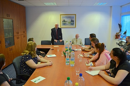 Ambassador Obsitnik talking to students and teachers.